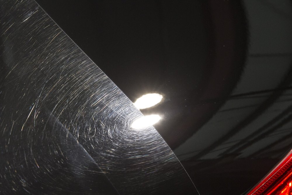 This Hood has had scratches in the paint removed.